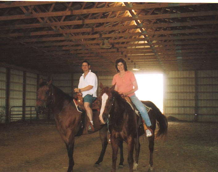 Mom and Dad on a horse